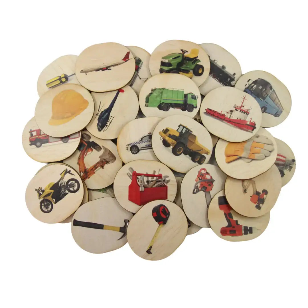 Collection of wooden discs with various vehicle and tool illustrations printed on them.