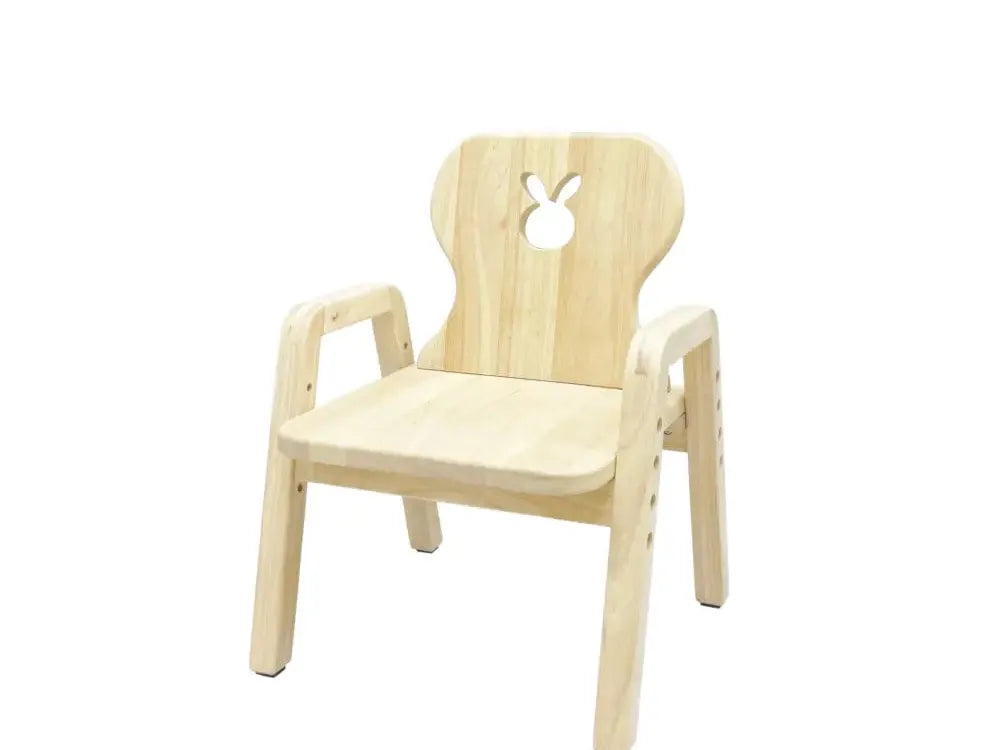 Pale wooden children’s chair with armrests and a rabbit-shaped cutout in the backrest.