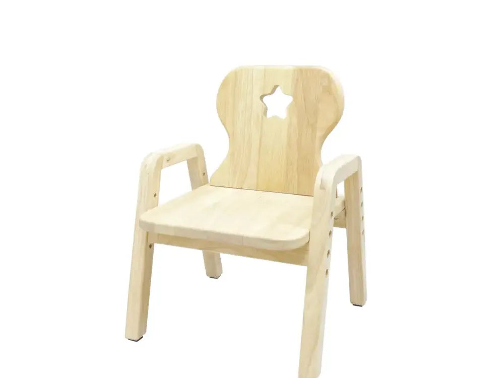 Pale wooden children’s chair with a star-shaped cutout in the backrest.
