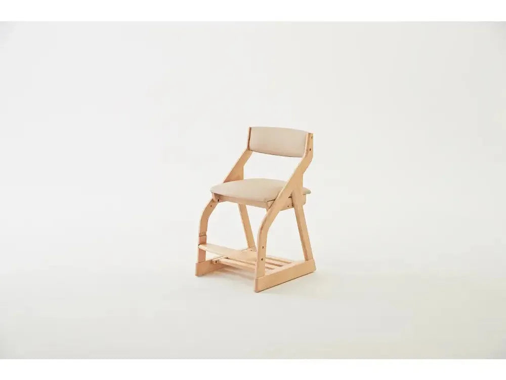Wooden chair with a curved backrest and beige cushioned seat.