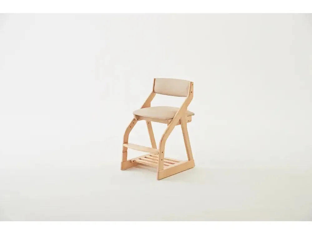 Wooden chair with a curved backrest and angled legs.