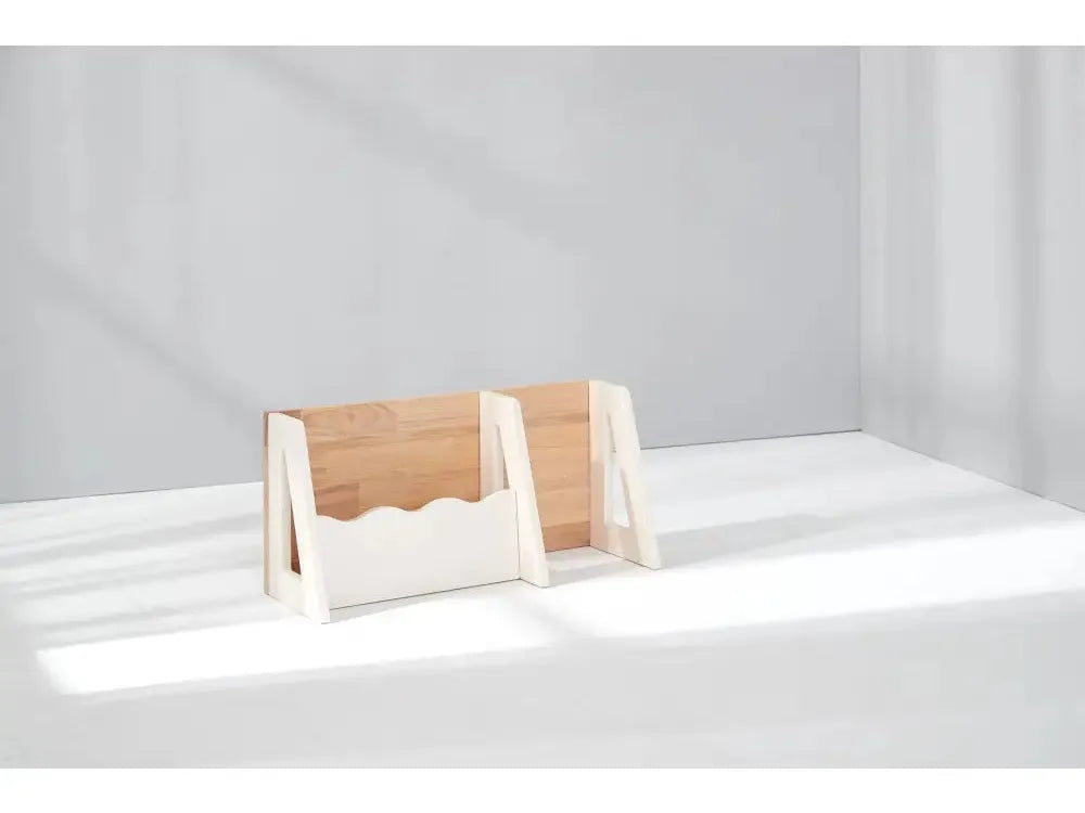 Wooden magazine rack or document holder with slanted sides.