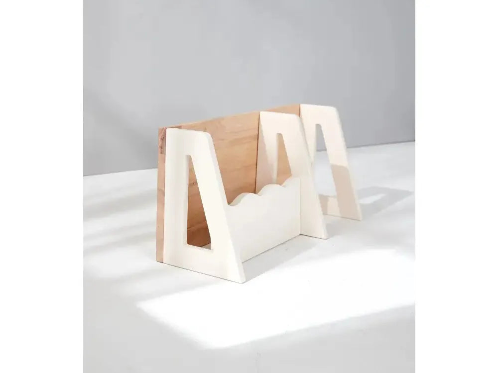 Wooden book holder or stand with a geometric, angular design.