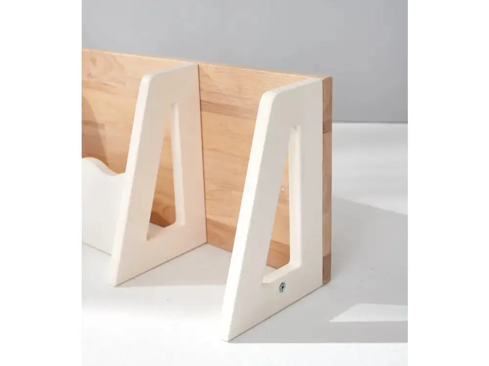 Minimalist wooden bookends with white-painted interior edges.
