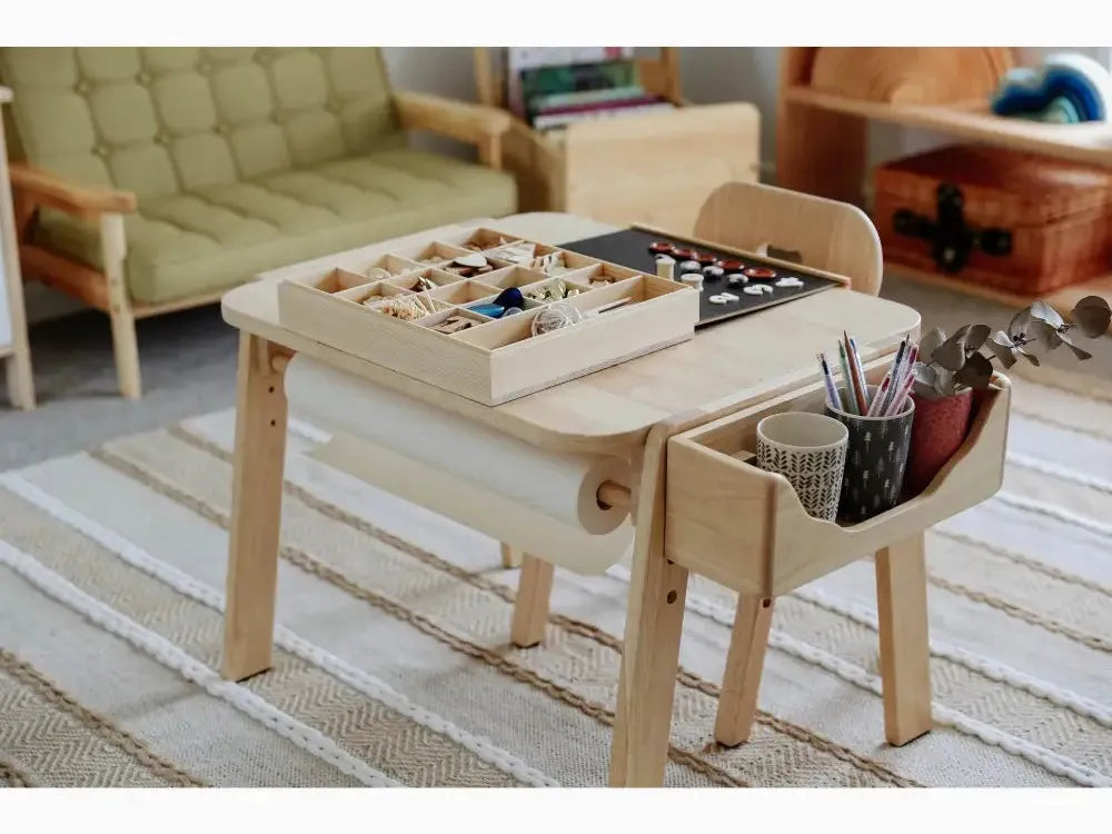Wooden children’s activity table with built-in storage compartments and attached organizer.