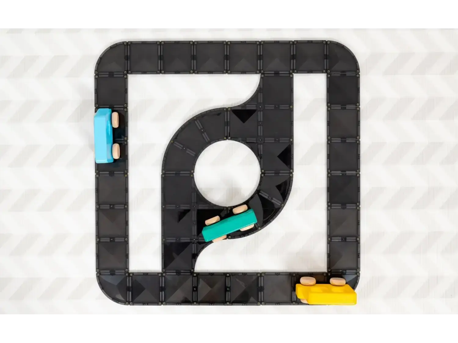 Stylized logo resembling the TikTok app icon made from toy building blocks.