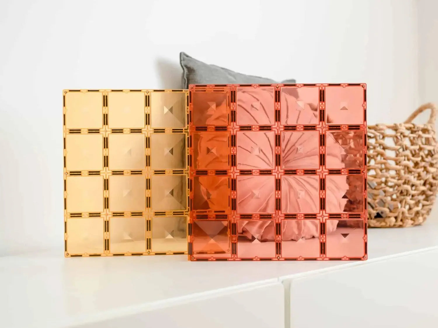 Colorful acrylic or glass grid panels in shades of yellow, orange, and pink.