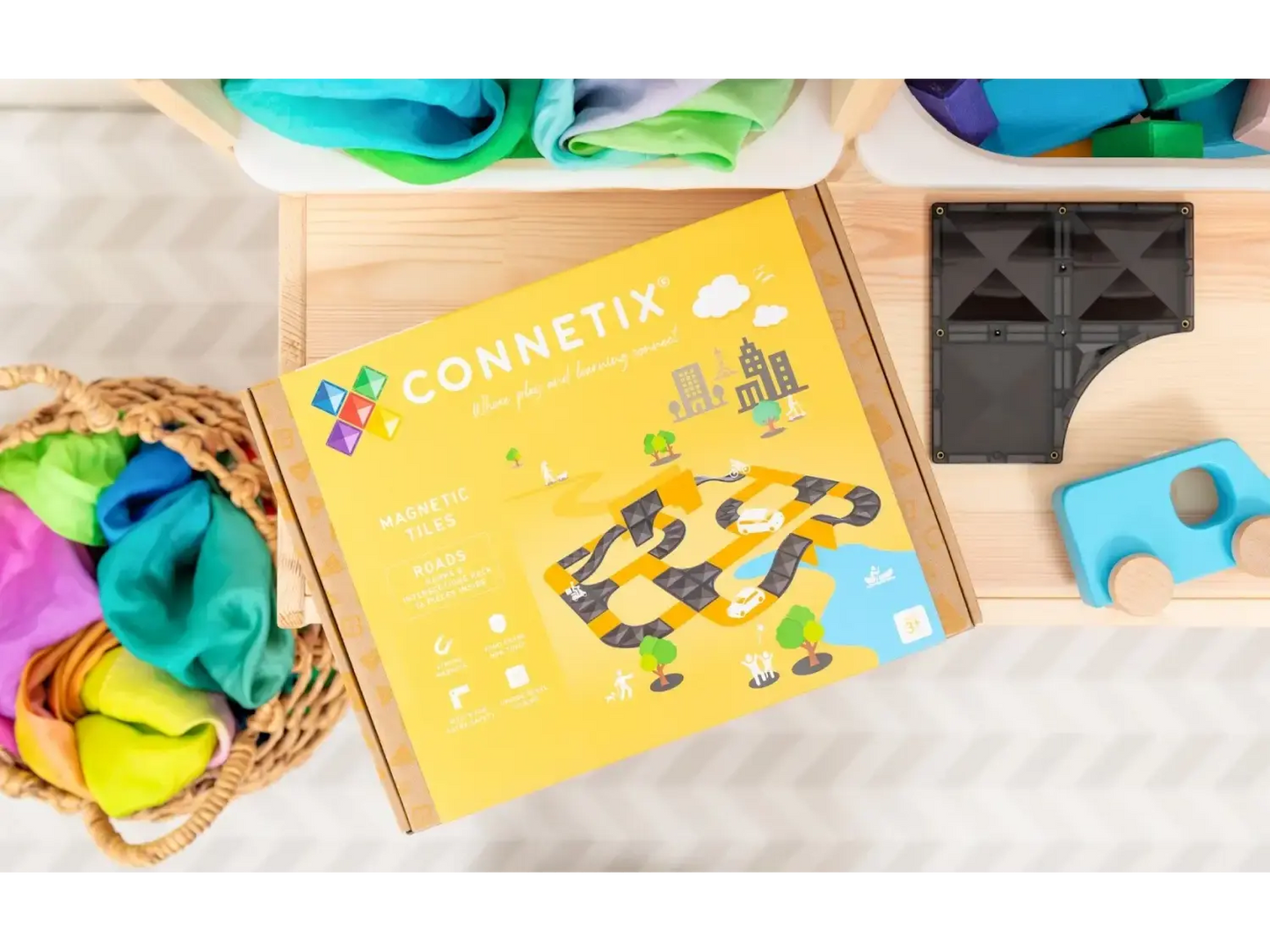 Yellow board game box labeled ’Connetix’ with colorful geometric shapes on the cover.