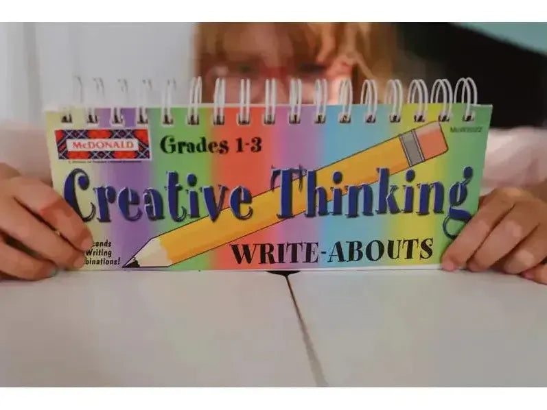 Spiral-bound book titled ’Creative Thinking Write-Abouts’ for grades 1-3.
