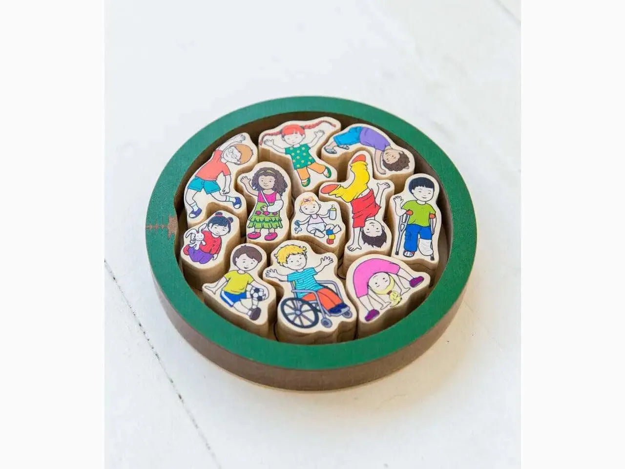 Green circular container filled with colorful cartoon character cookies.