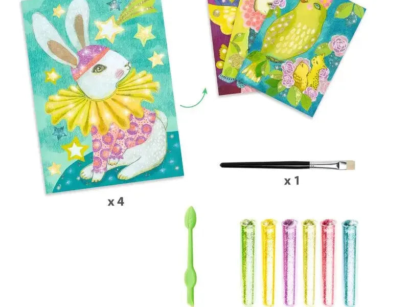 Colorful art kit featuring animal-themed cards, a paintbrush, and glitter pens.