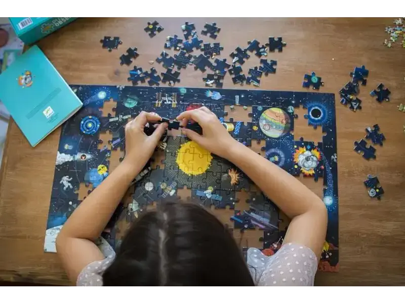 Jigsaw puzzle depicting a space or solar system scene.