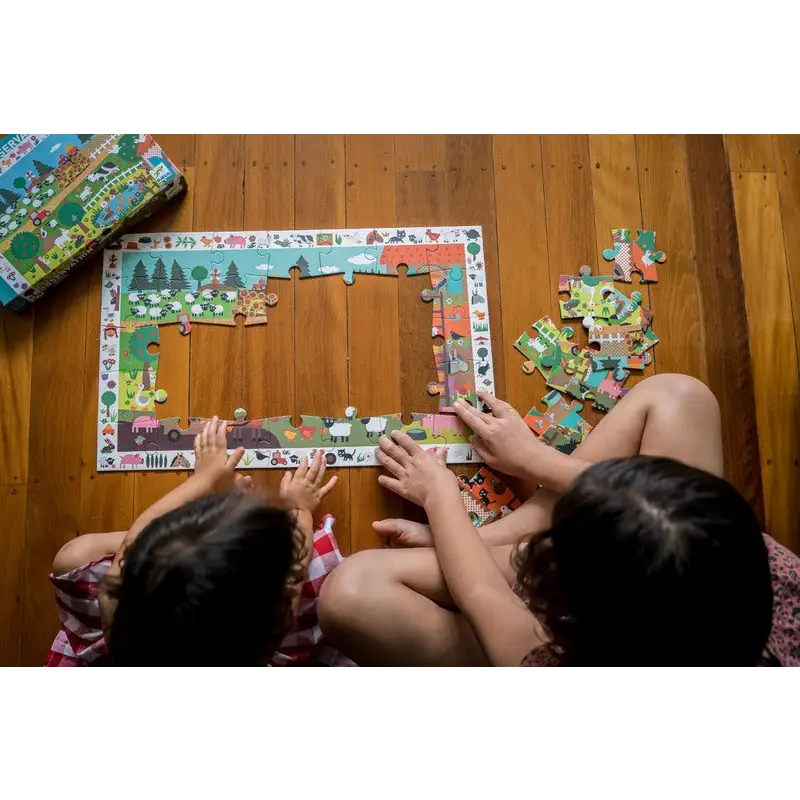 Partially completed jigsaw puzzle with colorful cartoon scenes.