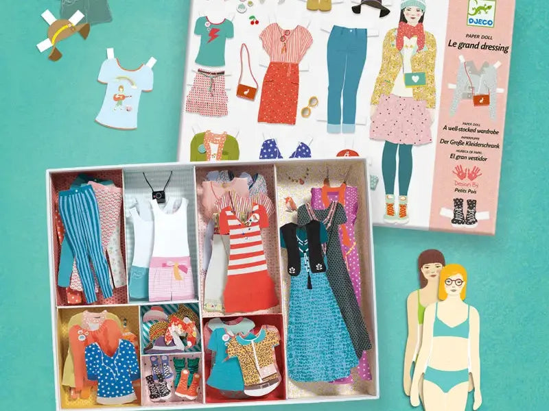 Paper doll set with various clothing items and accessories.
