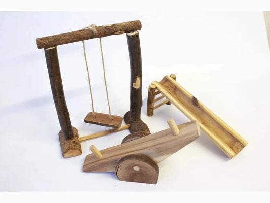 Wooden swing set with accompanying playground equipment pieces.