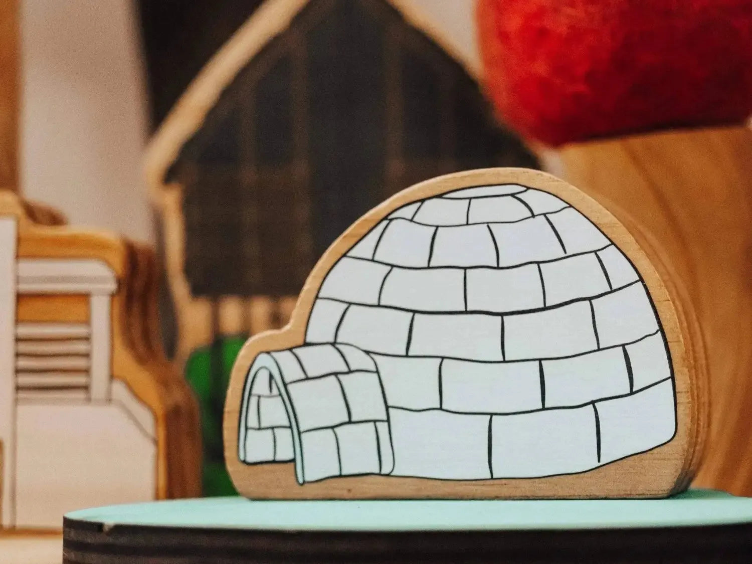 Wooden igloo toy.