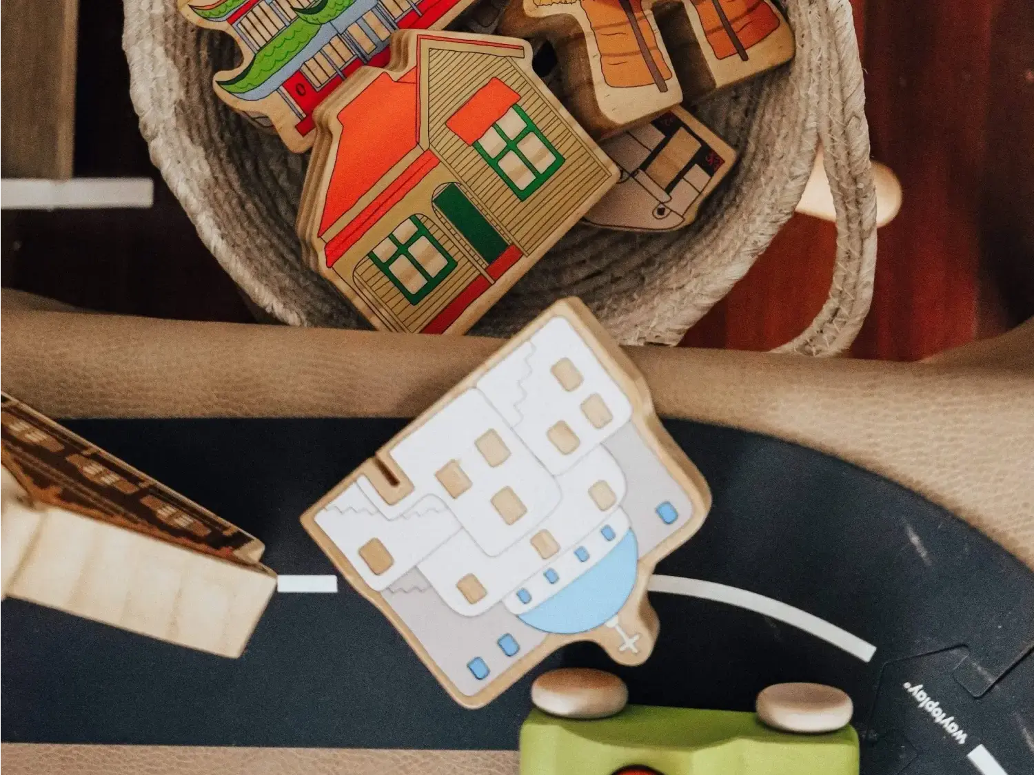 Wooden toy building blocks and car.