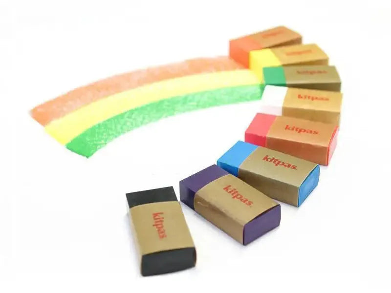 Rainbow-shaped arrangement of colorful erasers.