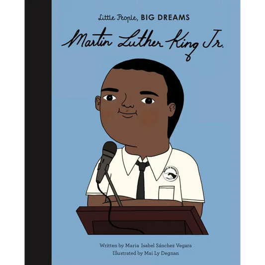 Illustrated book cover featuring a cartoon portrait of a young African American boy at a podium with a microphone.