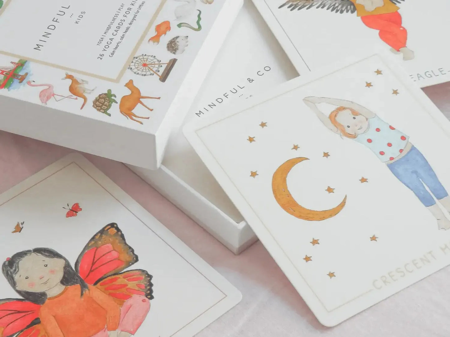 Collection of illustrated cards or prints featuring whimsical designs.