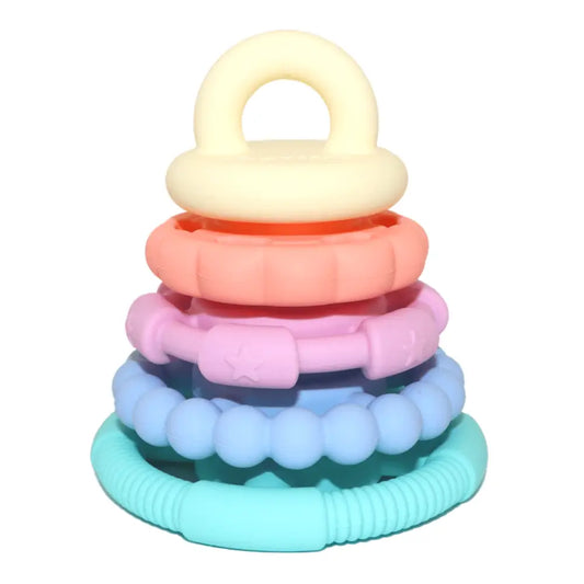 Colorful stacking toy with pastel-hued rings and a teething ring on top.