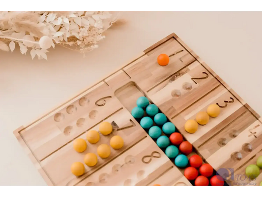 Wooden counting board with colorful beads arranged in rows.