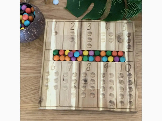 Wooden counting board with colorful beads.