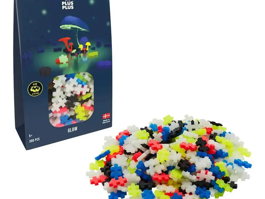 Colorful interlocking plastic building blocks or tiles in various shapes.