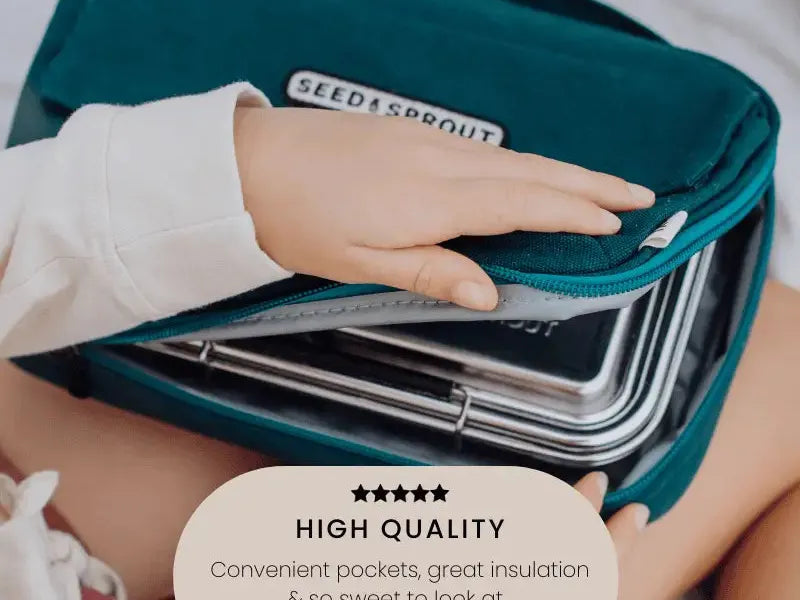 Teal insulated lunch bag with a hand opening it to reveal metal containers inside.