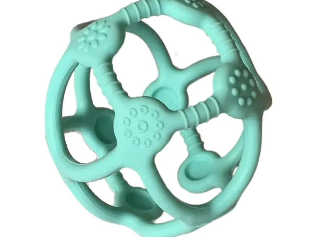 Mint green teething toy with various textured shapes and holes.
