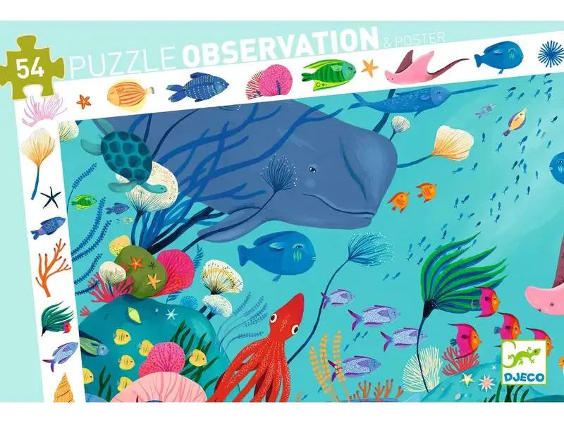 Colorful underwater scene featuring various sea creatures and a prominent blue whale.