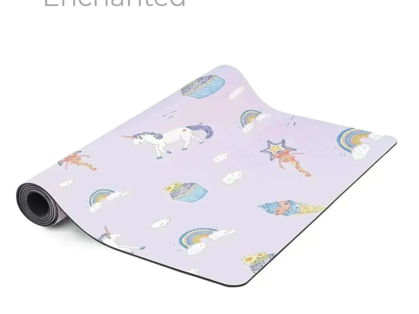 Yoga mat with a whimsical unicorn and rainbow pattern on a light purple background.