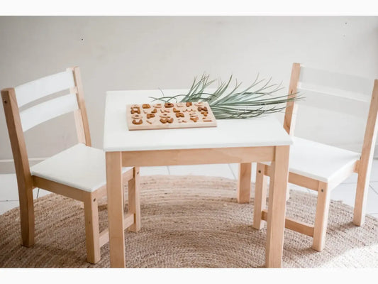 Wooden children’s table and chairs.