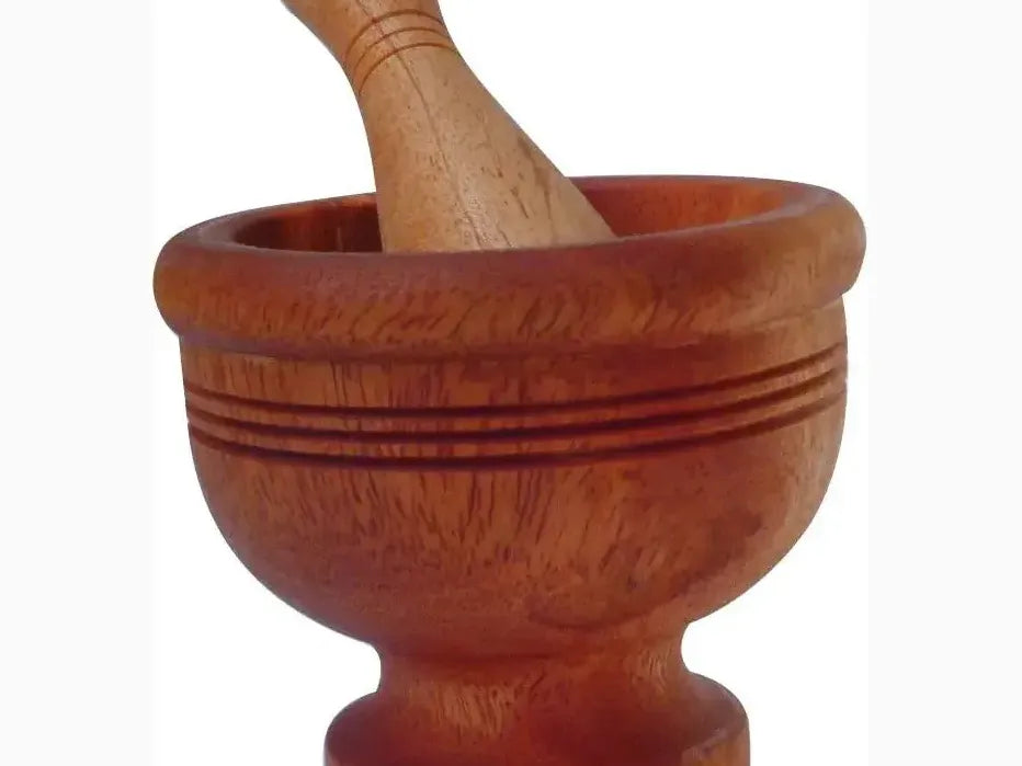 Wooden mortar and pestle.