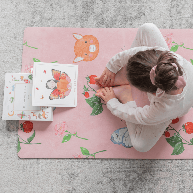 kid on a kids yoga mat