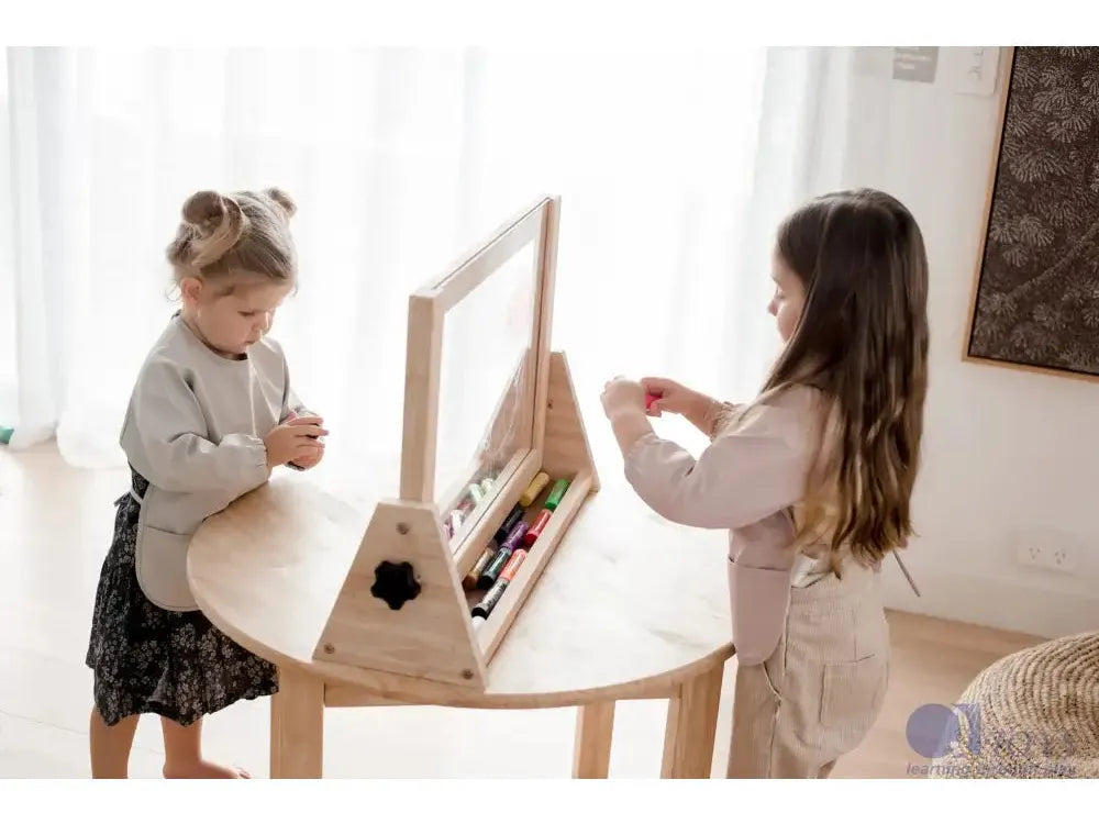 Wooden abacus or counting frame with colorful beads on a curved table.