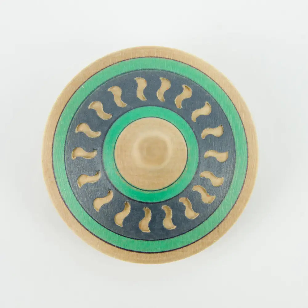 Circular fidget spinner with green, gold, and gray concentric rings featuring wavy patterns.