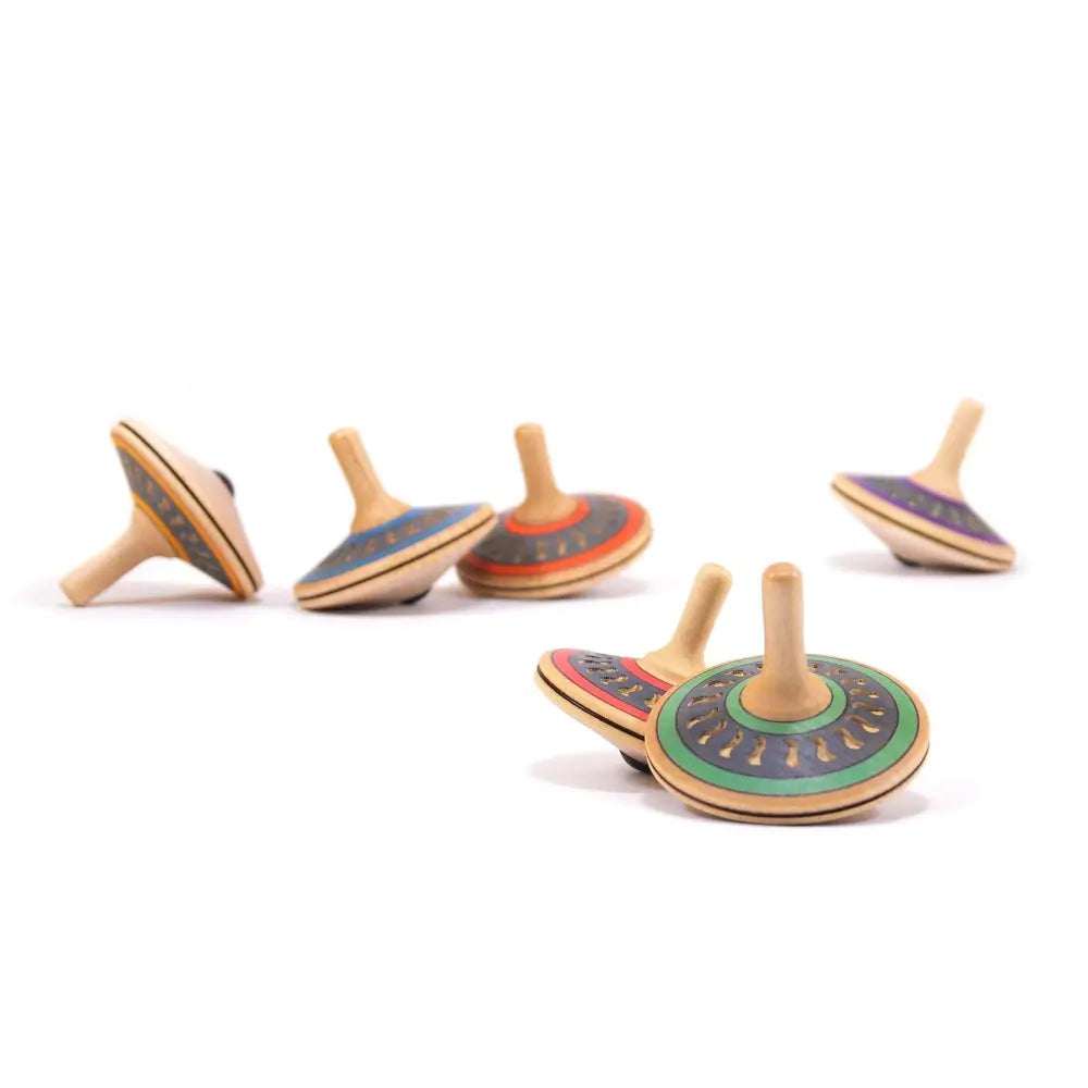 Wooden spinning tops with colorful painted designs.