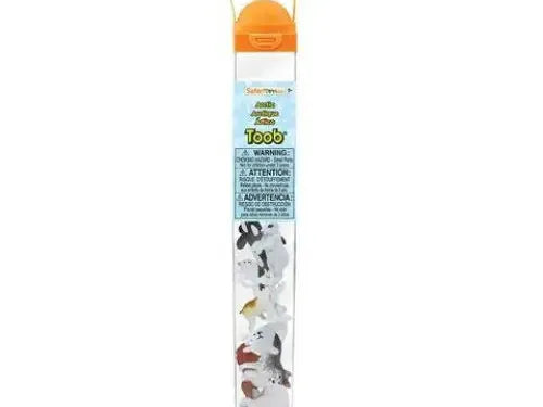 Cylindrical tube containing toy arctic animals.