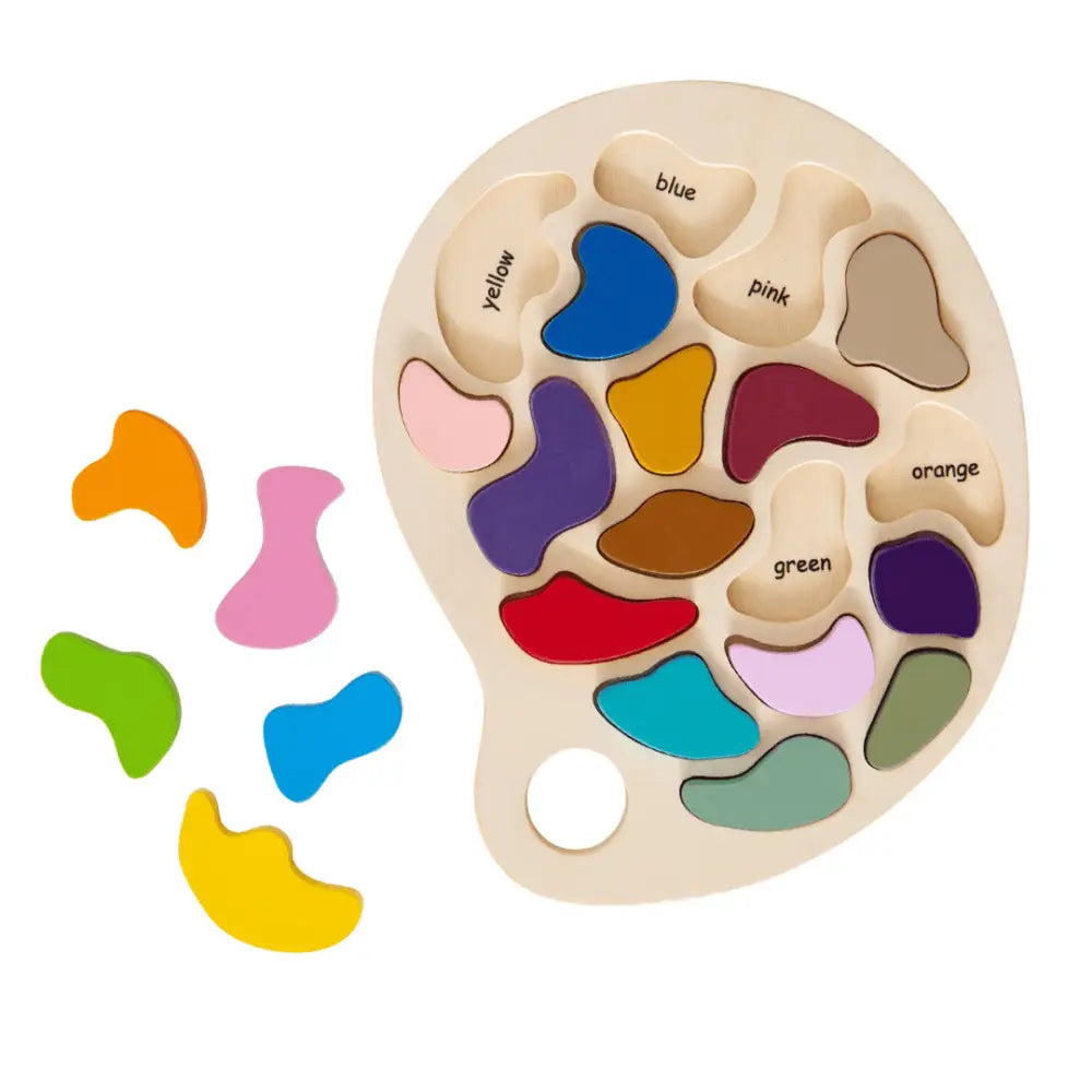 Wooden palette-shaped puzzle with colorful abstract pieces representing different colors.