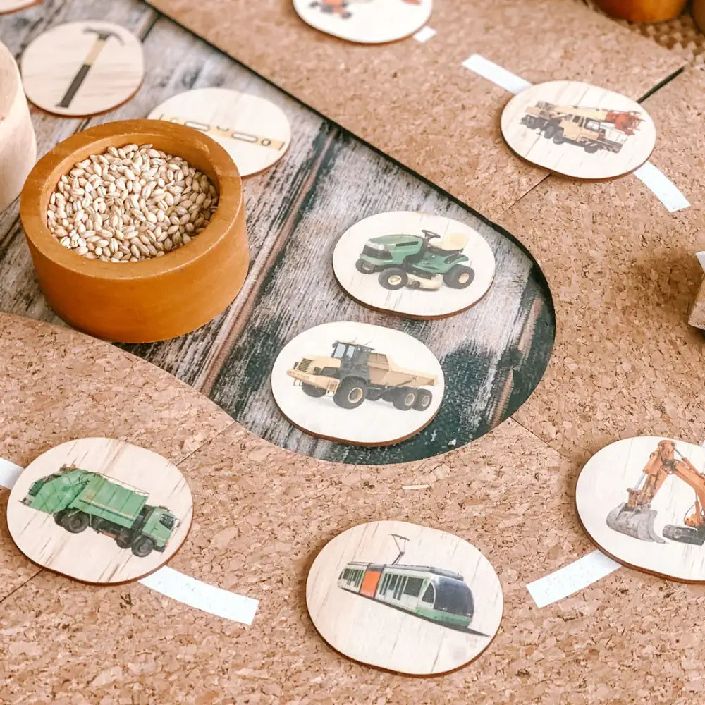 Circular cards with illustrations of various vehicles and construction equipment.