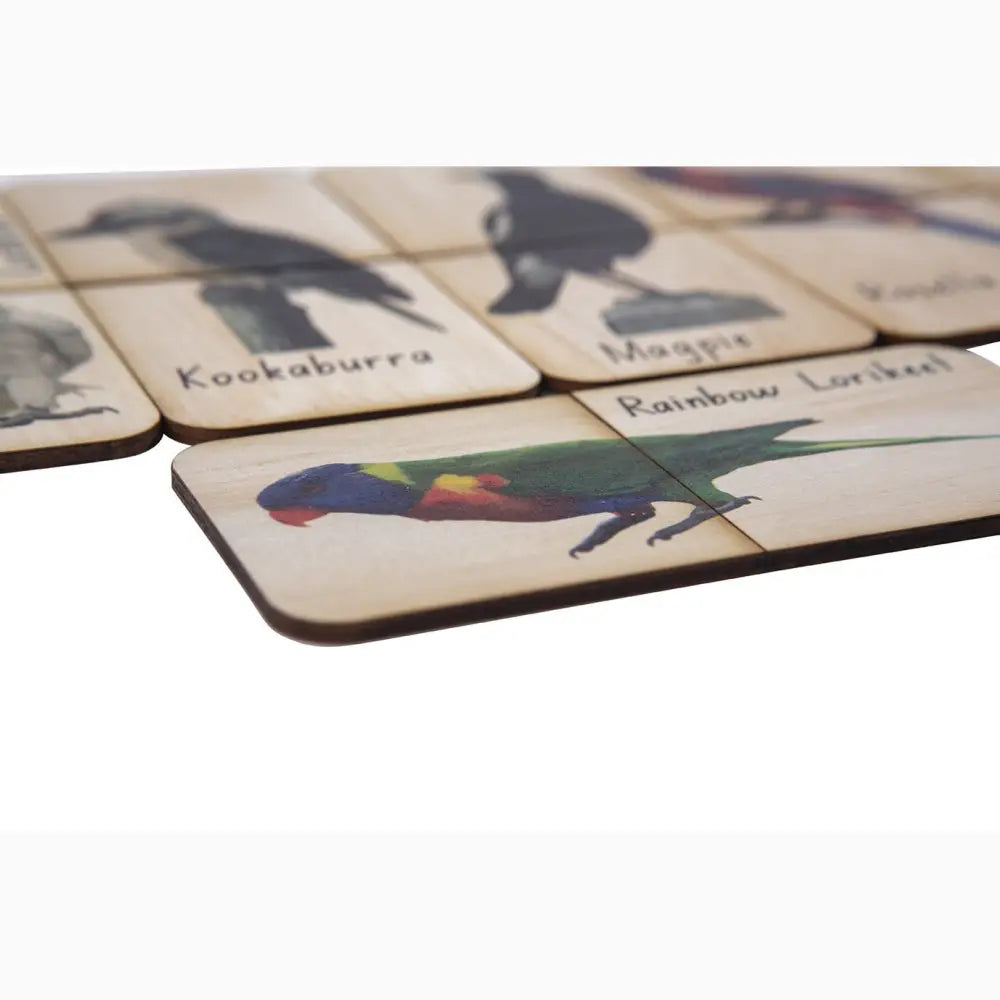 Wooden tiles featuring illustrations of Australian birds and their names.