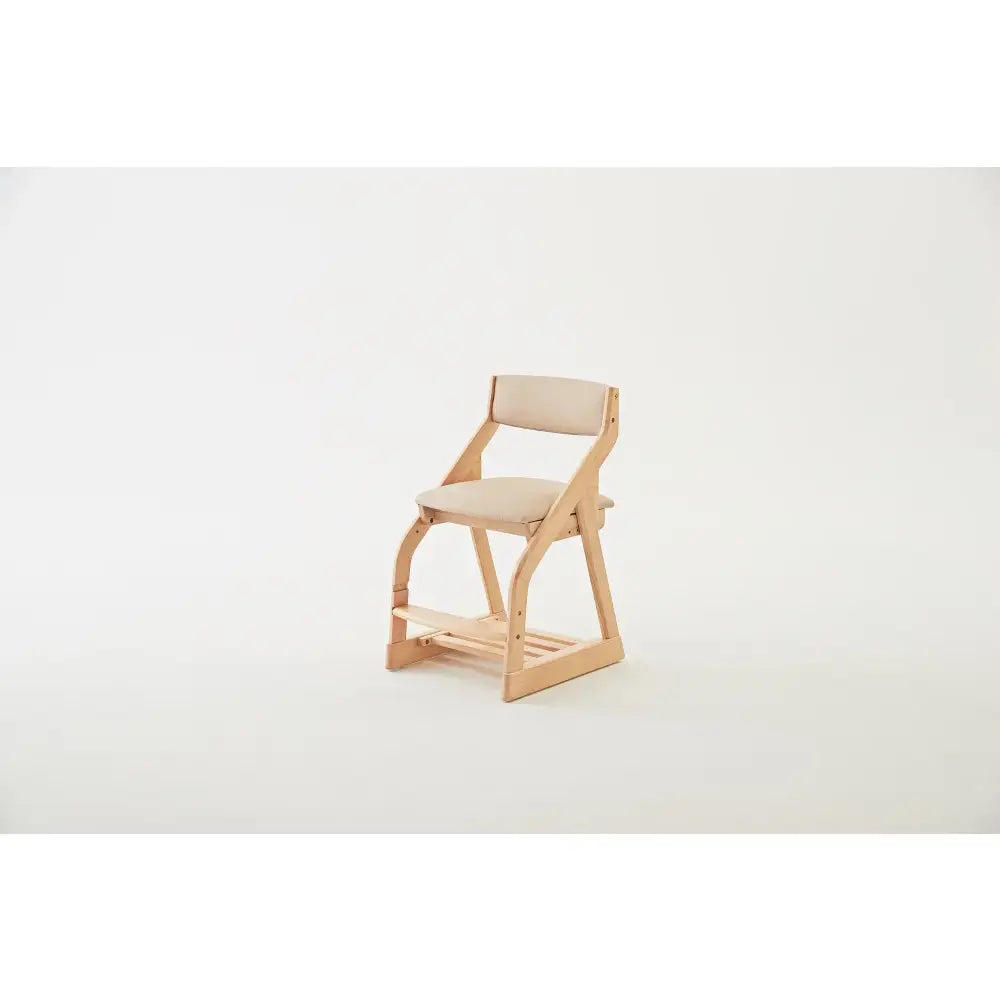 Wooden chair with a curved backrest and beige cushioned seat.