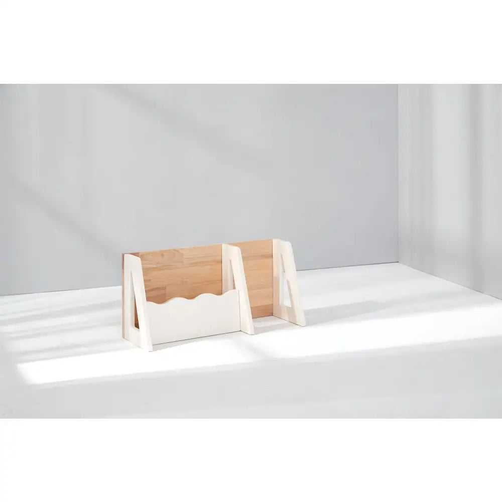 Wooden magazine rack or document holder with slanted sides.