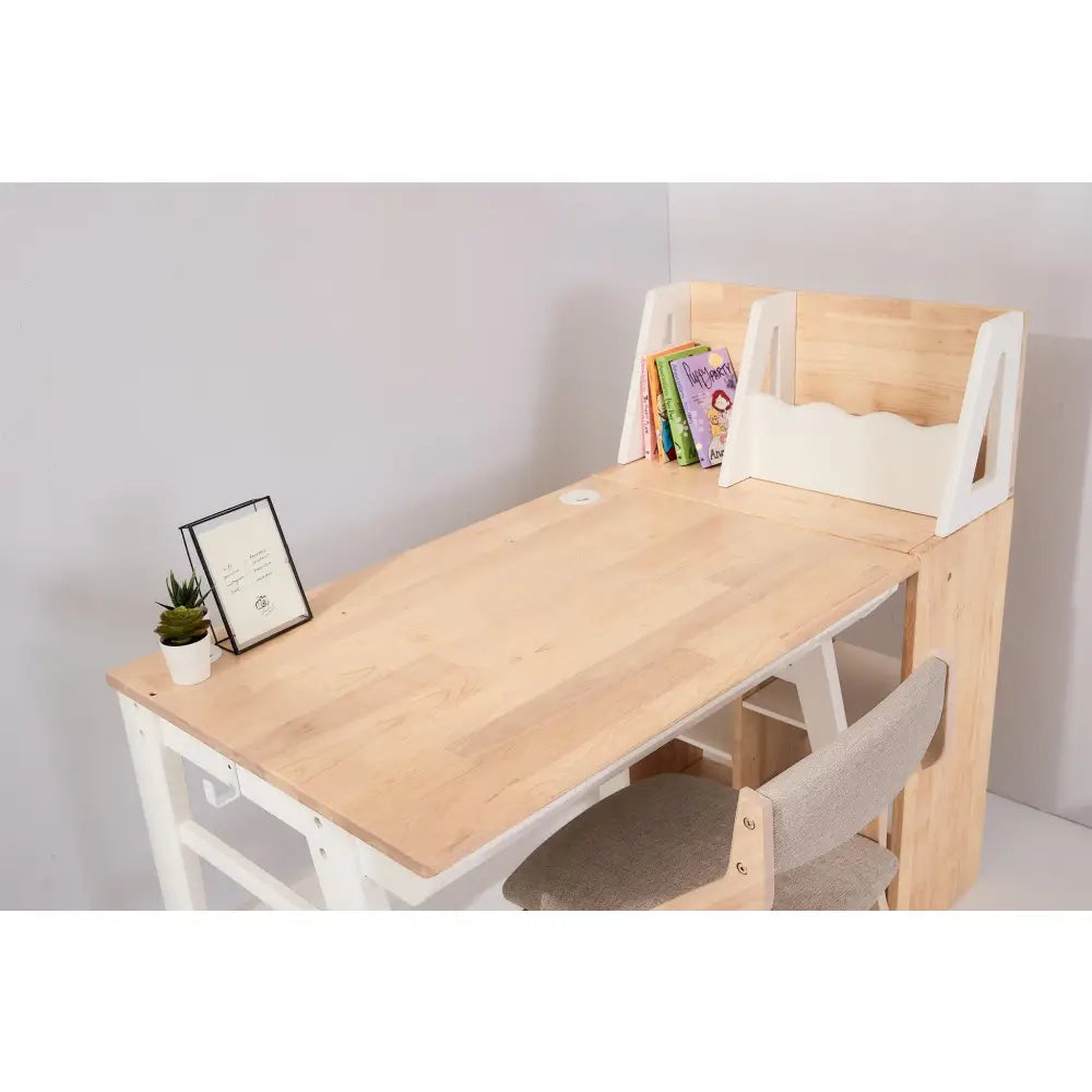 Wooden desk with attached bookshelf and white chair.