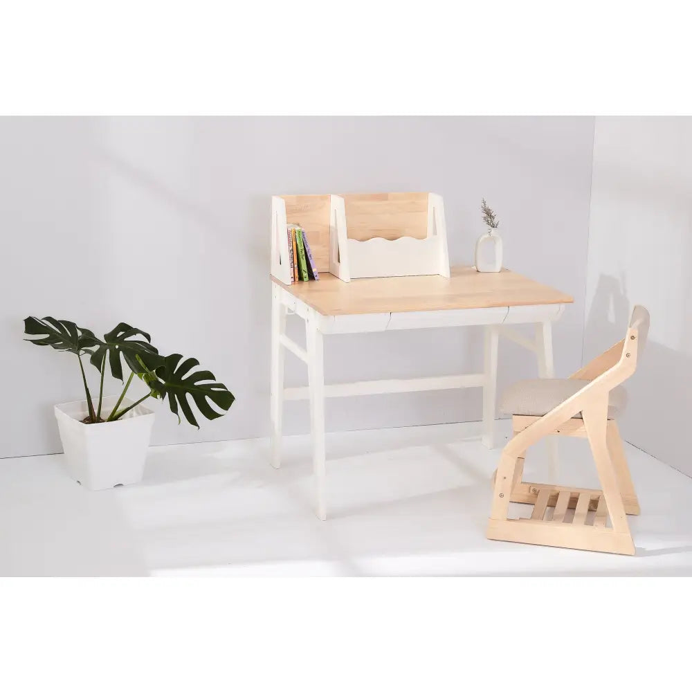 Wooden desk with a white frame and small backboard shelf.