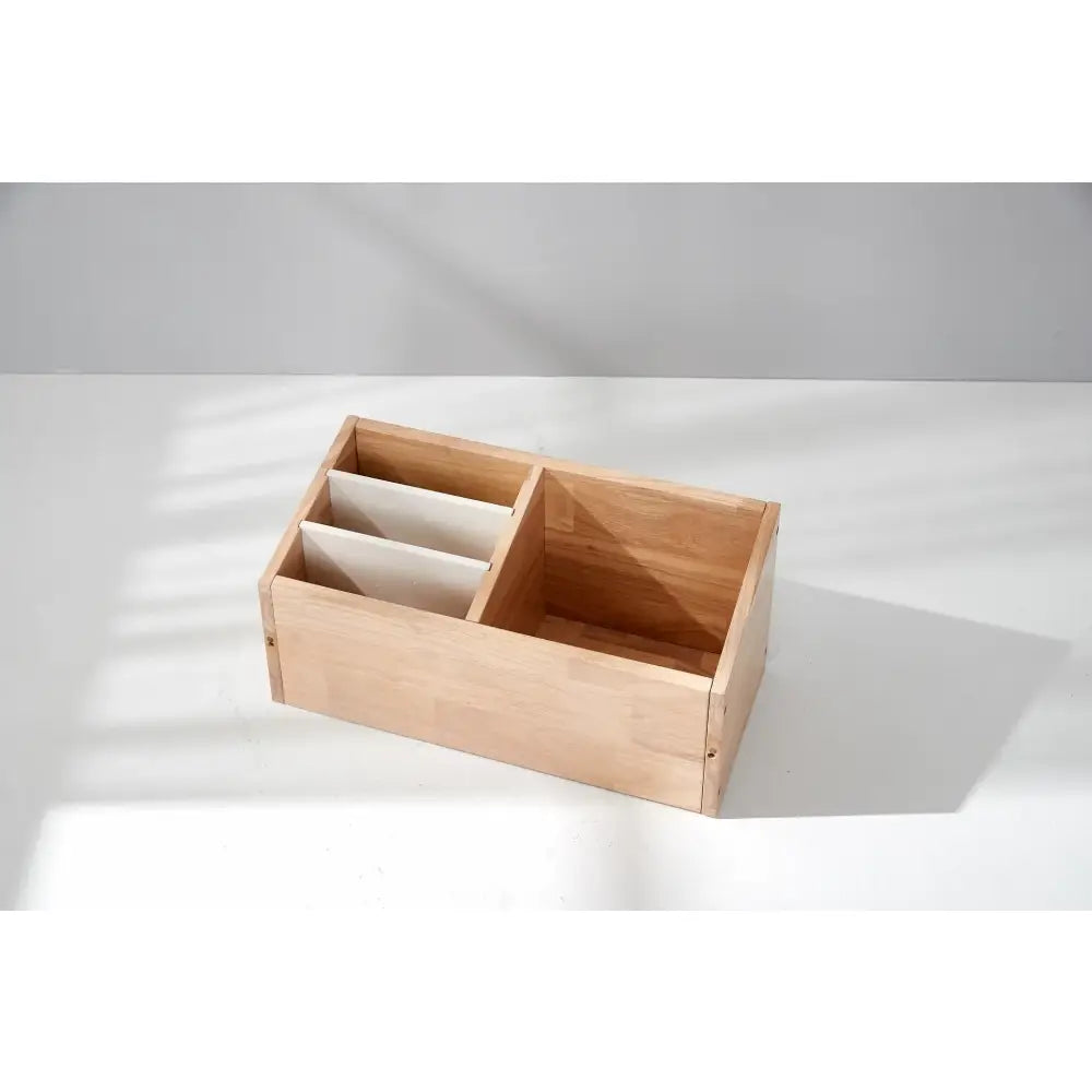 Wooden organizer box with compartments.