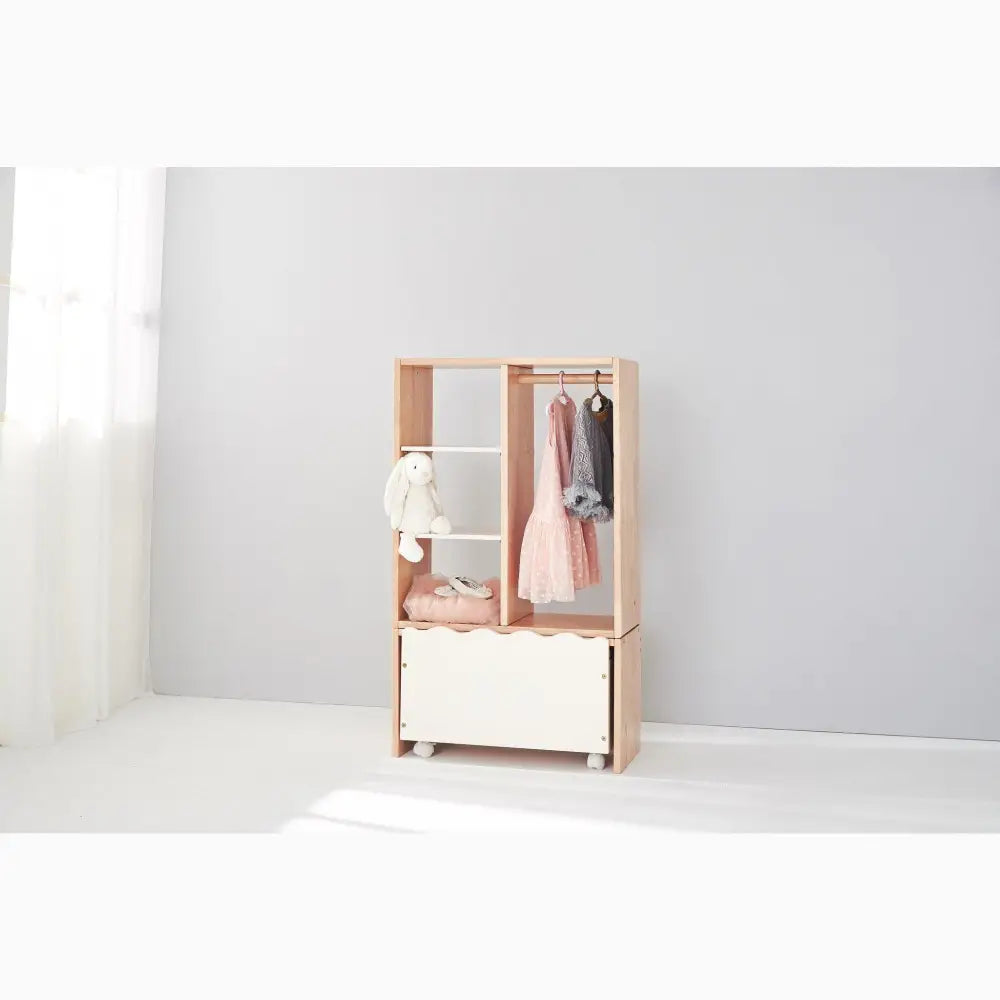 Wooden wardrobe with open shelving and a hanging rod for clothes.