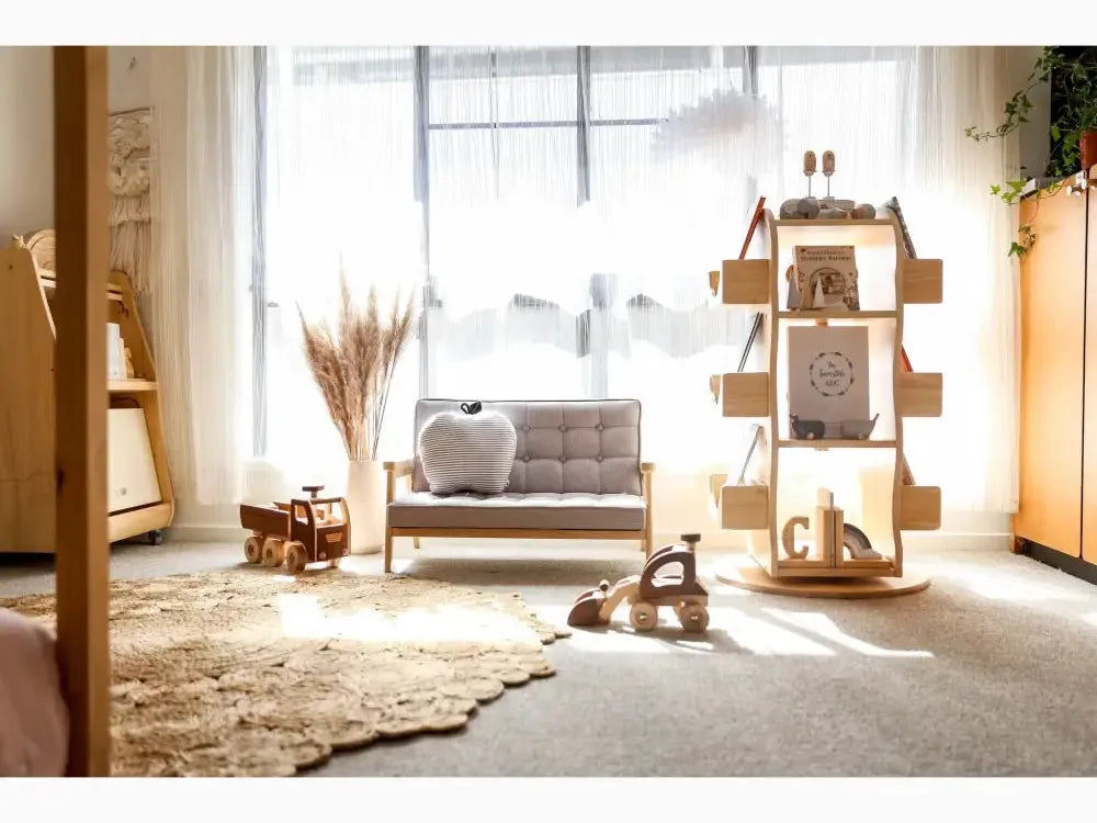 Cozy nursery or children’s room with natural wood furniture and soft textures.
