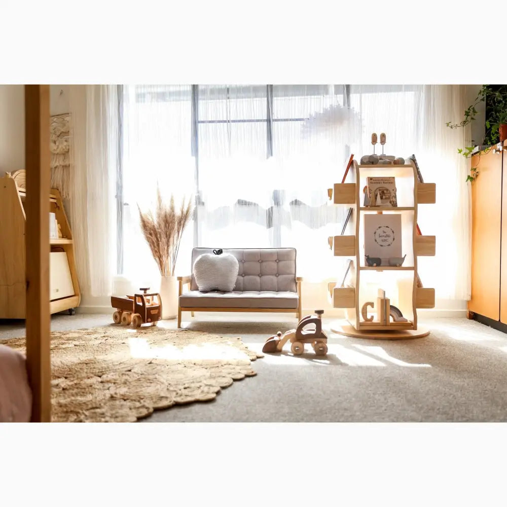 Cozy nursery or children’s room with natural wood furniture and soft textures.